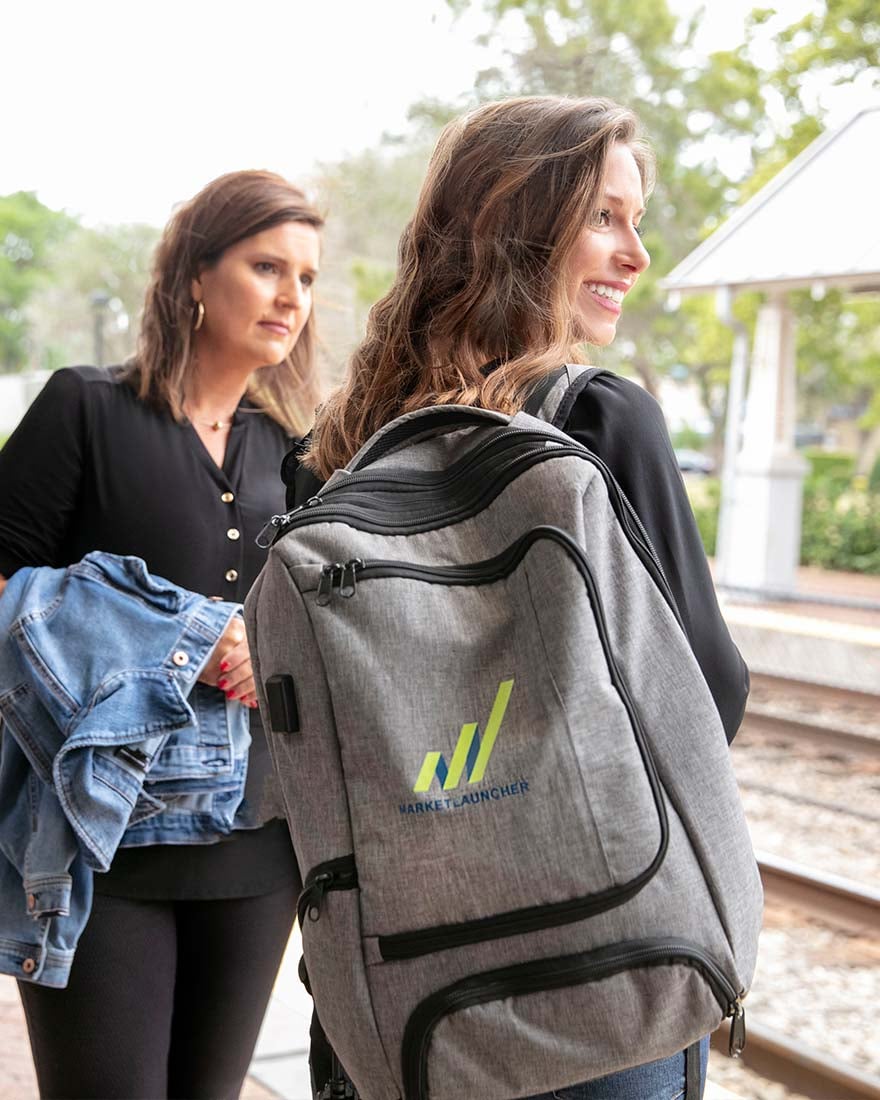 Mary-White-and-Brooke-Castino_BackPack-and-Train-Station_Original-880x1100